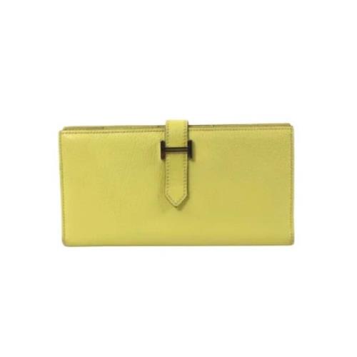 Pre-owned Leather wallets Hermès Vintage , Yellow , Dames