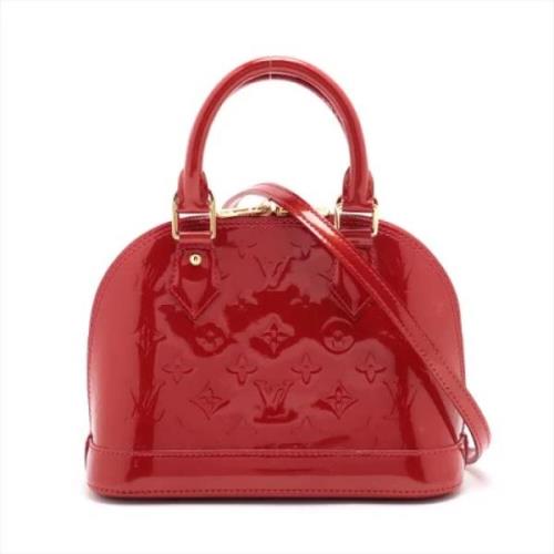 Pre-owned Leather handbags Louis Vuitton Vintage , Red , Dames