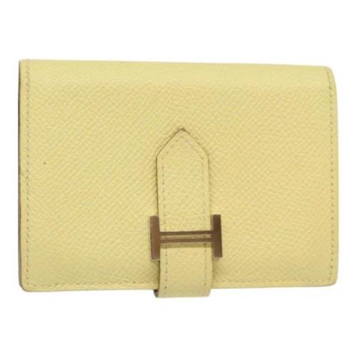 Pre-owned Leather wallets Hermès Vintage , Yellow , Dames