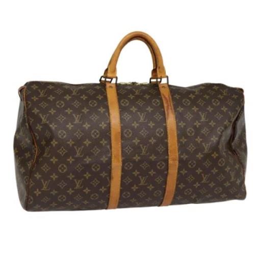 Pre-owned Canvas travel-bags Louis Vuitton Vintage , Brown , Dames