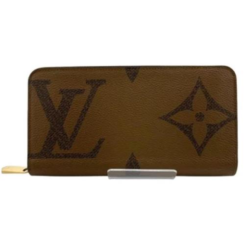 Pre-owned Fabric wallets Louis Vuitton Vintage , Brown , Dames