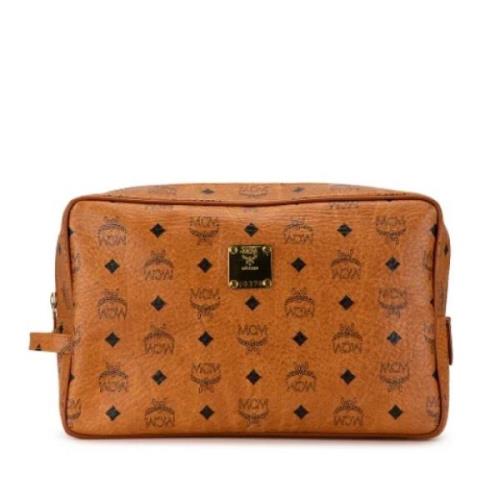 Pre-owned Fabric clutches MCM Pre-owned , Brown , Dames