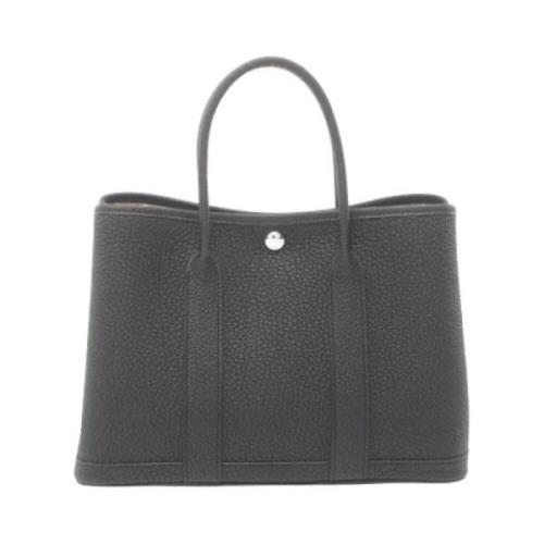 Pre-owned Leather handbags Hermès Vintage , Black , Dames