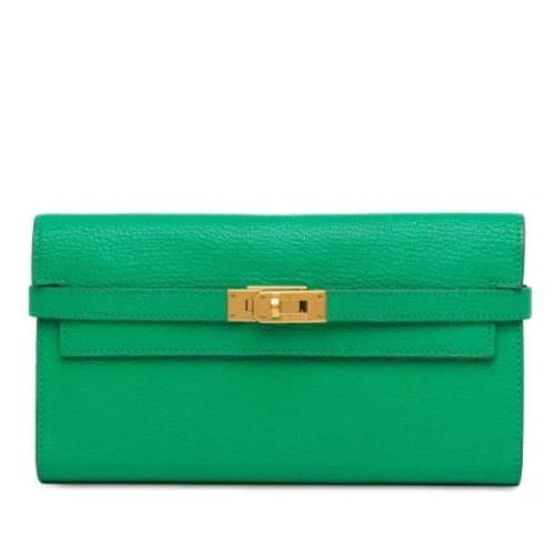 Pre-owned Leather wallets Hermès Vintage , Green , Dames