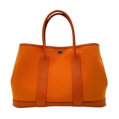 Pre-owned Leather handbags Hermès Vintage , Orange , Dames