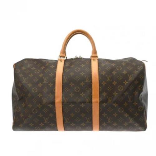 Pre-owned Canvas handbags Louis Vuitton Vintage , Brown , Dames