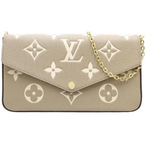 Pre-owned Fabric wallets Louis Vuitton Vintage , Beige , Dames