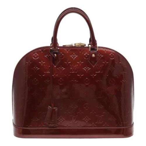 Pre-owned Leather handbags Louis Vuitton Vintage , Red , Dames