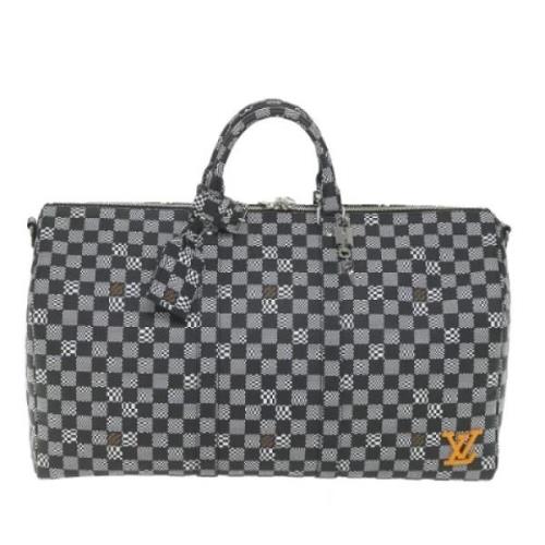 Pre-owned Canvas handbags Louis Vuitton Vintage , Black , Dames