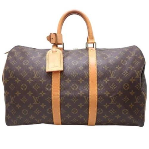 Pre-owned Canvas handbags Louis Vuitton Vintage , Brown , Dames