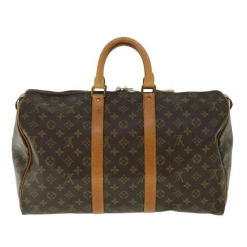 Pre-owned Canvas handbags Louis Vuitton Vintage , Brown , Unisex