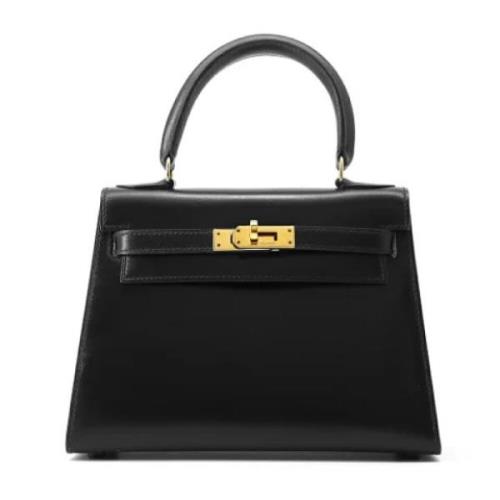 Pre-owned Leather handbags Hermès Vintage , Black , Dames