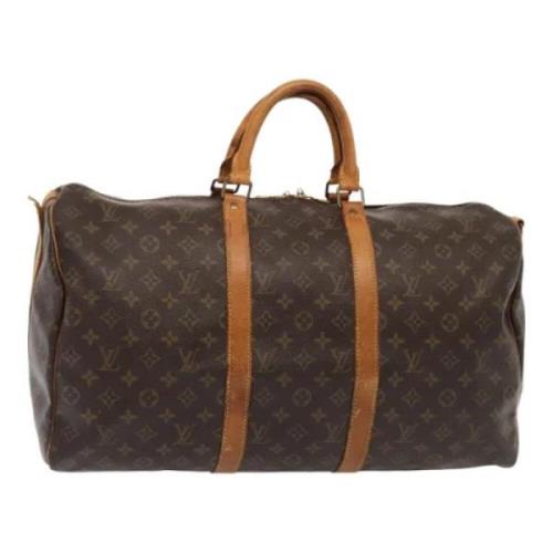 Pre-owned Canvas travel-bags Louis Vuitton Vintage , Brown , Dames