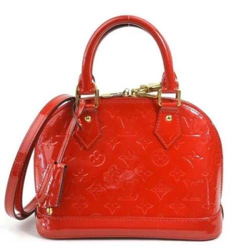 Pre-owned Leather handbags Louis Vuitton Vintage , Red , Dames