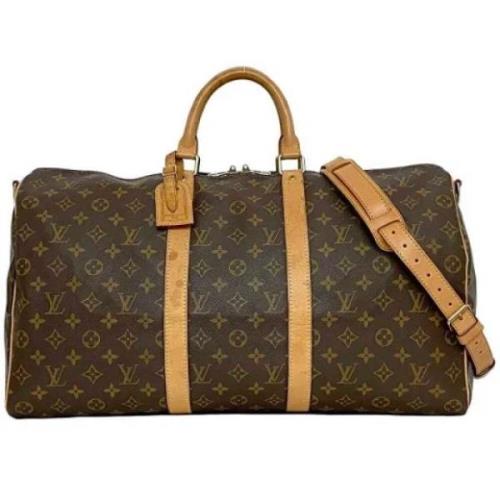 Pre-owned Canvas handbags Louis Vuitton Vintage , Brown , Dames