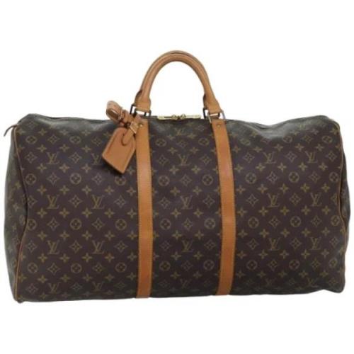 Pre-owned Canvas handbags Louis Vuitton Vintage , Brown , Dames