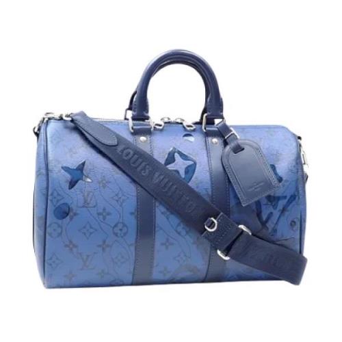 Pre-owned Canvas handbags Louis Vuitton Vintage , Blue , Dames