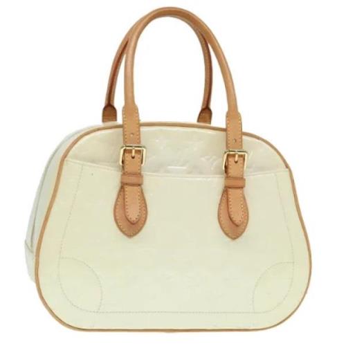 Pre-owned Leather handbags Louis Vuitton Vintage , Beige , Dames