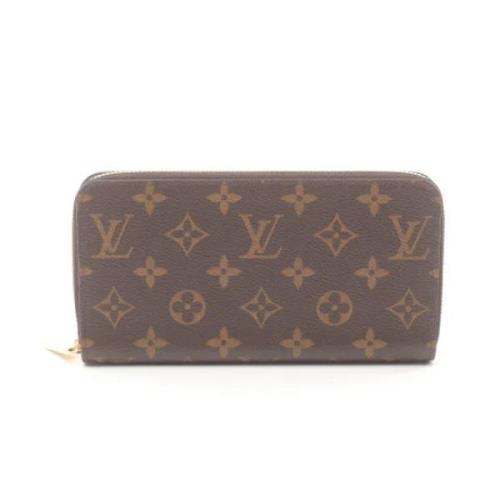 Pre-owned Leather wallets Louis Vuitton Vintage , Brown , Dames