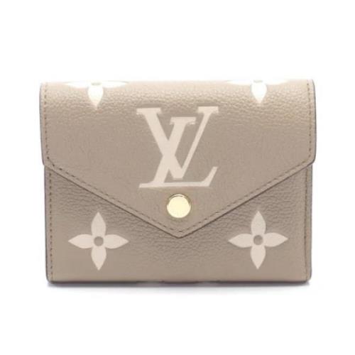 Pre-owned Leather wallets Louis Vuitton Vintage , Beige , Dames