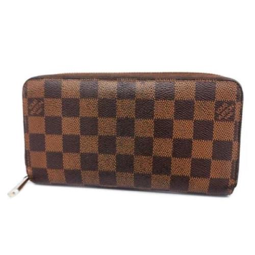 Pre-owned Fabric wallets Louis Vuitton Vintage , Brown , Dames