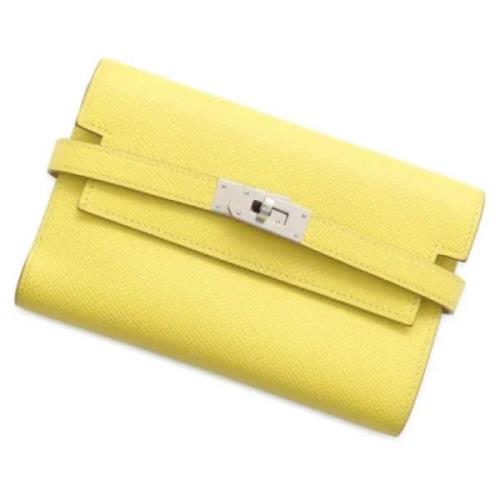 Pre-owned Leather wallets Hermès Vintage , Yellow , Dames