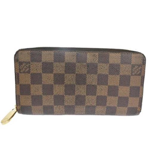 Pre-owned Canvas wallets Louis Vuitton Vintage , Brown , Dames