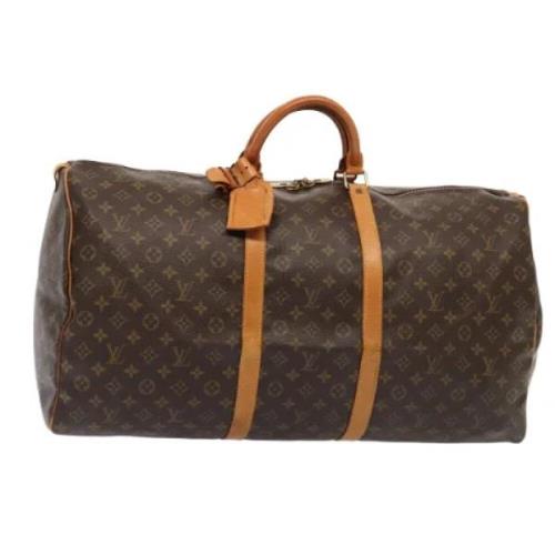 Pre-owned Canvas travel-bags Louis Vuitton Vintage , Brown , Dames