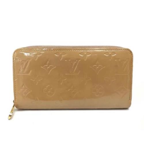 Pre-owned Leather wallets Louis Vuitton Vintage , Beige , Dames