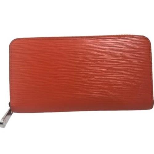 Pre-owned Leather wallets Louis Vuitton Vintage , Orange , Dames