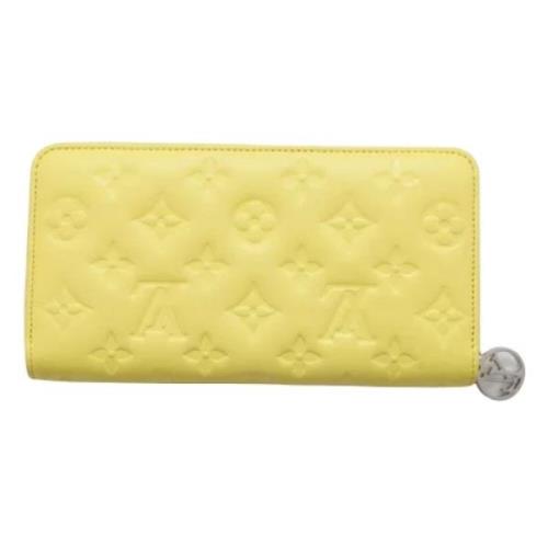 Pre-owned Leather wallets Louis Vuitton Vintage , Yellow , Dames