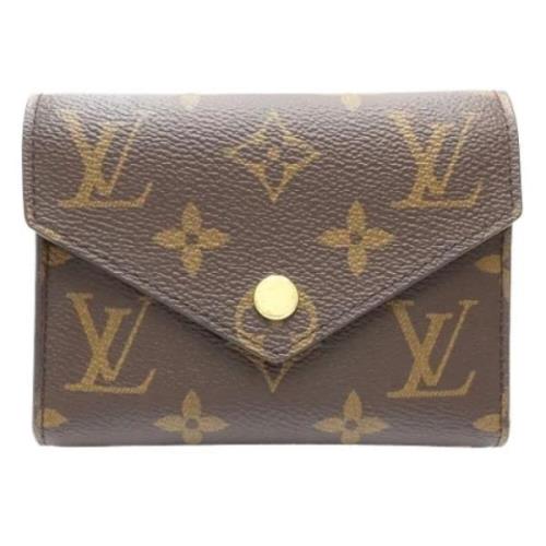 Pre-owned Canvas wallets Louis Vuitton Vintage , Brown , Dames