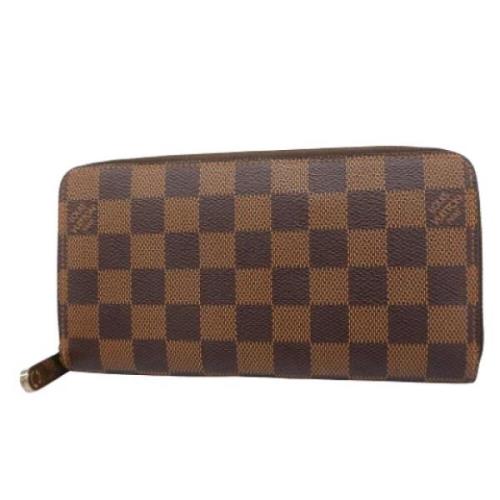 Pre-owned Canvas wallets Louis Vuitton Vintage , Brown , Dames