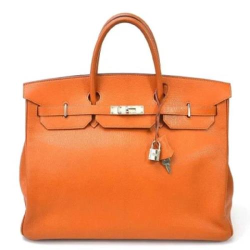 Pre-owned Leather handbags Hermès Vintage , Orange , Dames