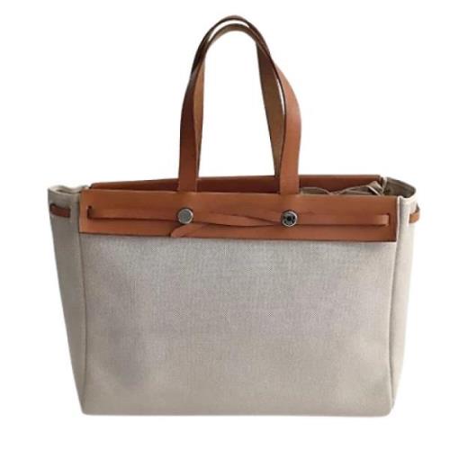 Pre-owned Canvas handbags Hermès Vintage , Beige , Dames