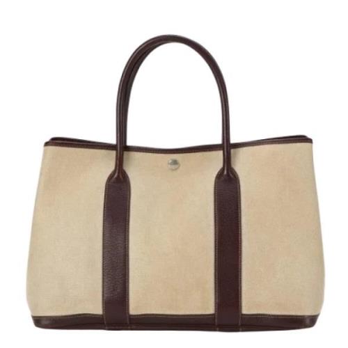 Pre-owned Canvas handbags Hermès Vintage , Beige , Dames