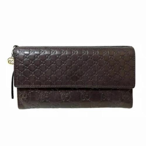 Pre-owned Leather wallets Gucci Vintage , Brown , Dames