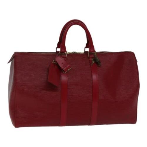 Pre-owned Leather travel-bags Louis Vuitton Vintage , Red , Dames