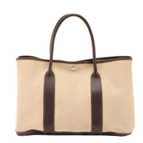 Pre-owned Canvas handbags Hermès Vintage , Beige , Heren