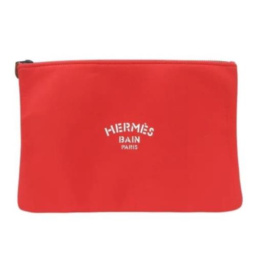 Pre-owned Fabric clutches Hermès Vintage , Red , Dames