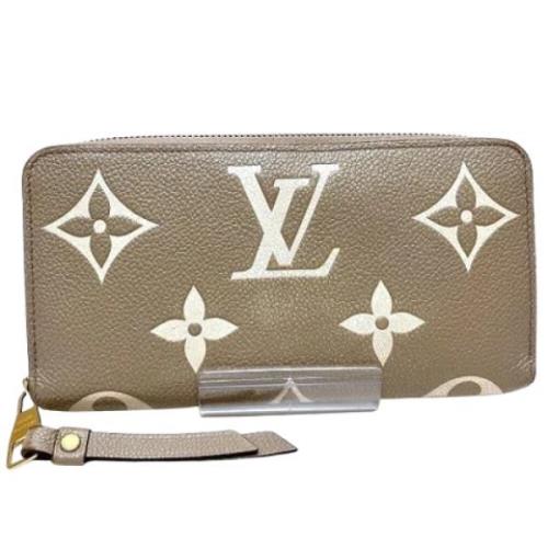 Pre-owned Fabric wallets Louis Vuitton Vintage , Beige , Dames