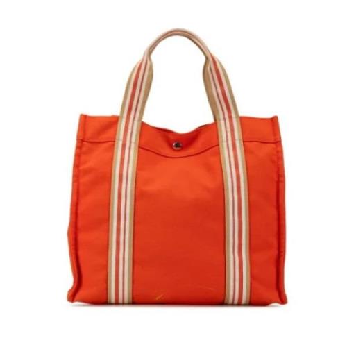 Pre-owned Canvas handbags Hermès Vintage , Orange , Dames