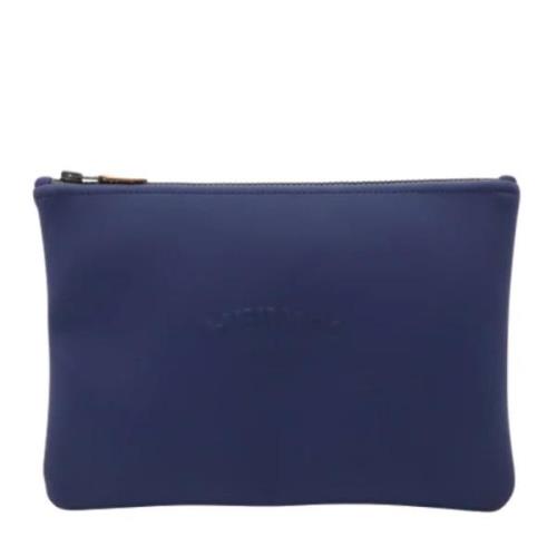 Pre-owned Leather clutches Hermès Vintage , Blue , Dames