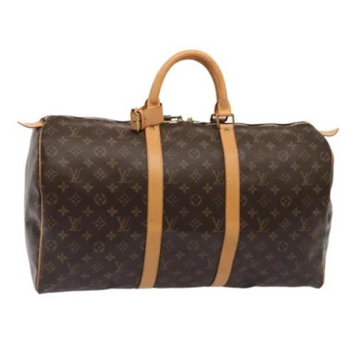 Pre-owned Canvas travel-bags Louis Vuitton Vintage , Brown , Dames