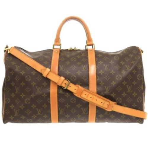 Pre-owned Canvas handbags Louis Vuitton Vintage , Brown , Dames