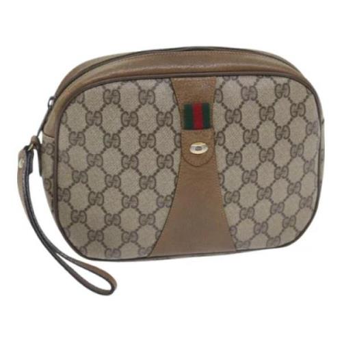 Pre-owned Leather clutches Gucci Vintage , Beige , Dames