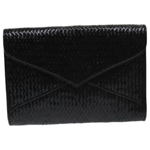 Pre-owned Leather clutches Yves Saint Laurent Vintage , Black , Dames