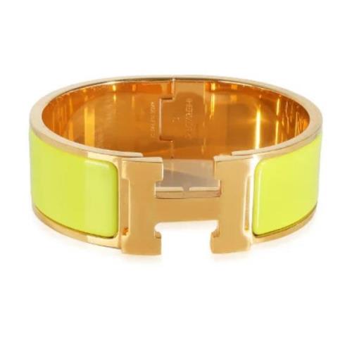 Pre-owned Metal bracelets Hermès Vintage , Yellow , Dames