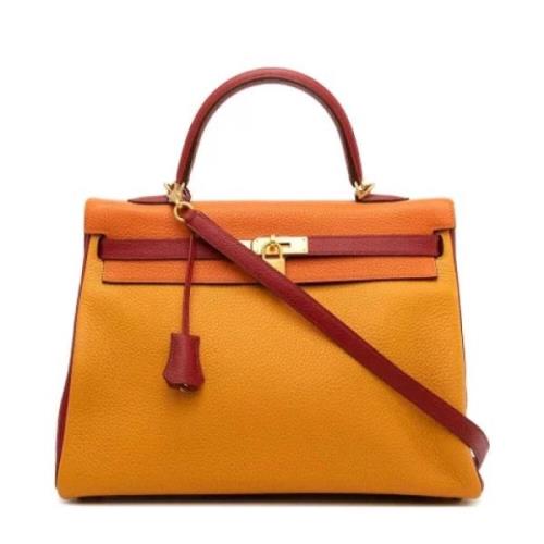 Pre-owned Leather handbags Hermès Vintage , Yellow , Dames