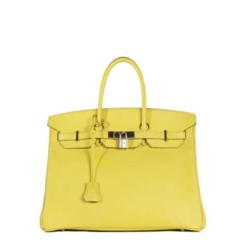 Pre-owned Leather handbags Hermès Vintage , Yellow , Dames